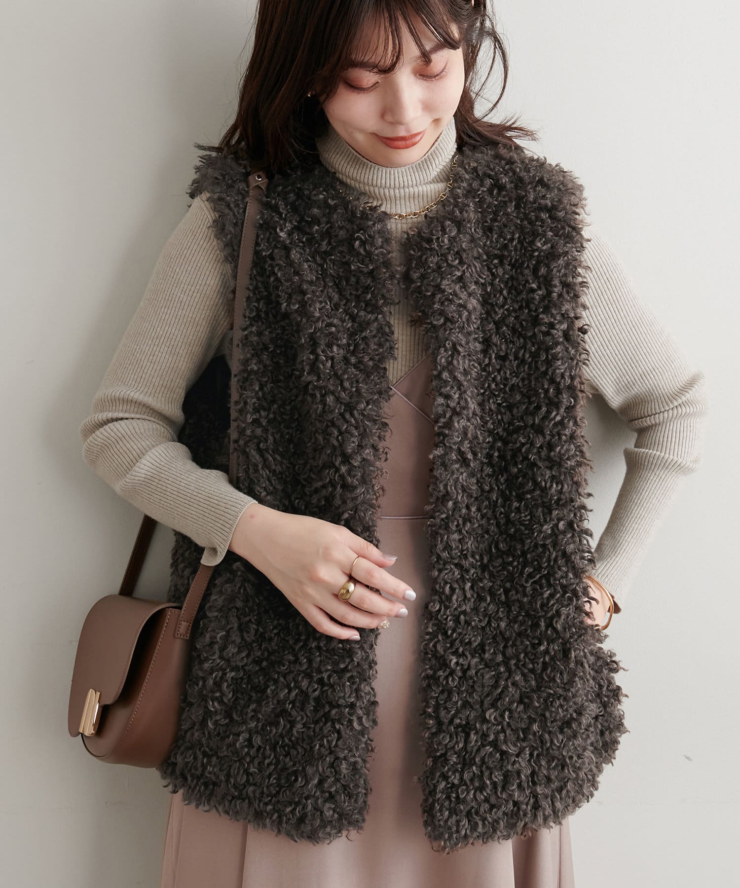 natural couture】プードルロングフェイクファーベスト | NICE CLAUP