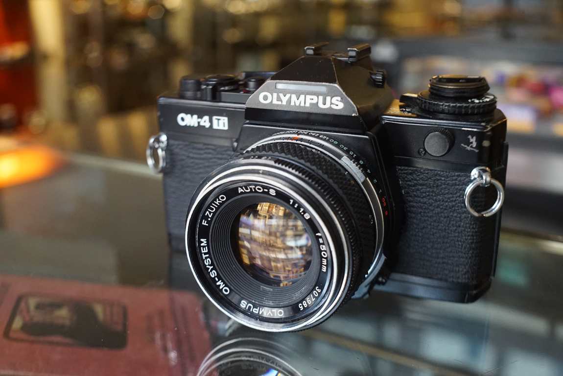 Olympus OM-4 TI black + Zuiko 50mm F/1.8 lens - Fotohandel